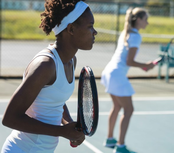 female-group-tennis-class-590X520